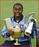Captain Mark Alleyne with all three one day trophies