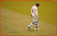 Andrew Strauss walks off after being bowled by James Allenby