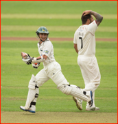 Happy in his work: James Taylor past bowler Peter Trego