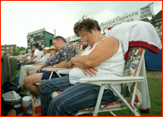 Slumbering spectators at a county game, Southampton