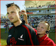 Baz Zuiderent is fitted with a Sky TV mic & earpiece, 2003