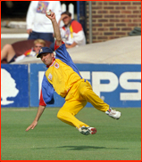 Lancashire's Ian Austin is out to this catch by Paul Grayson